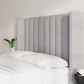 Close-up view of the Blackwell Bed headboard in stone, highlighting the intricate vertical channel design - Mattress King