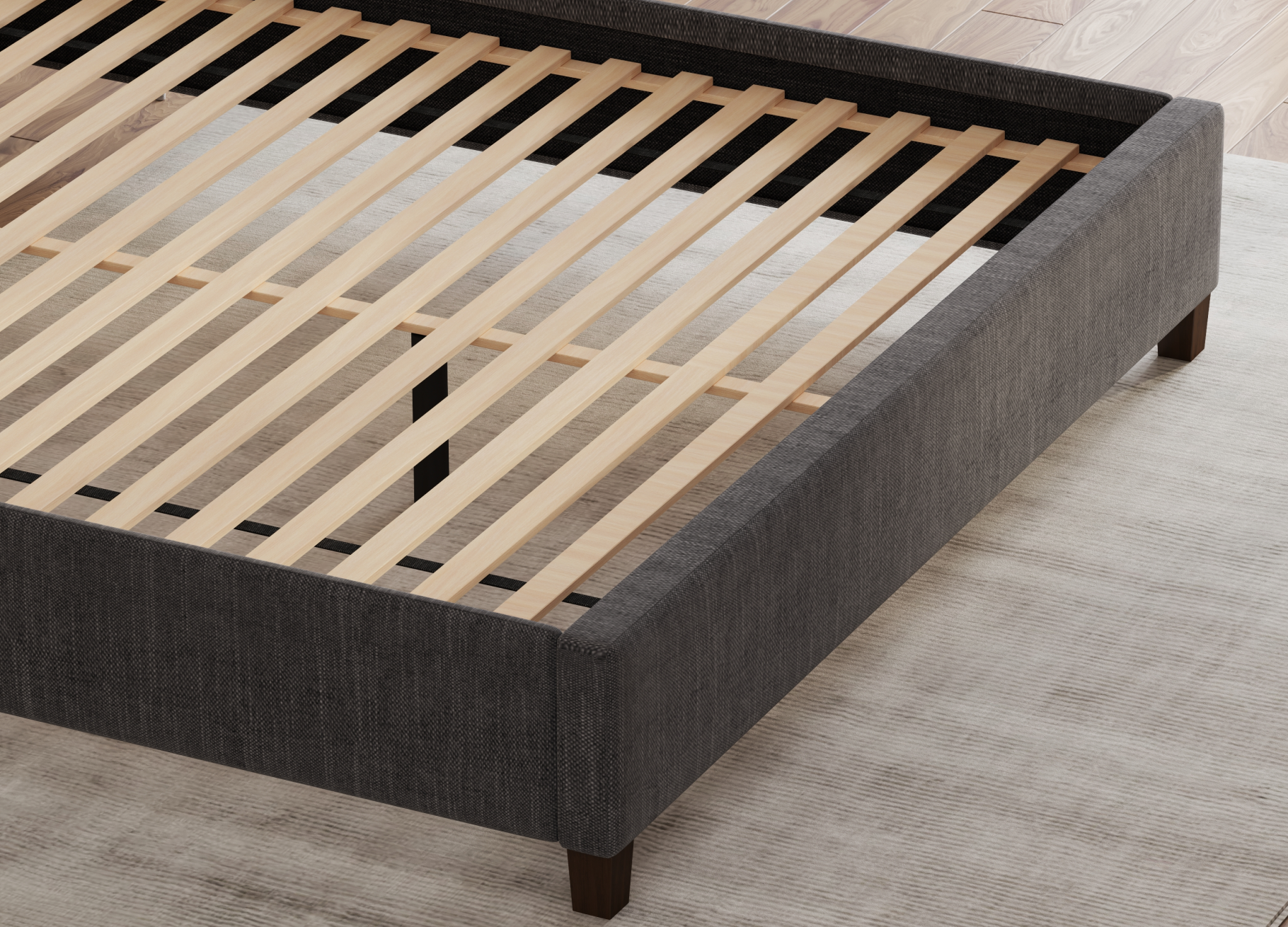 Showcasing the center support of the Charcoal Upholstered Eastman Platform Bed - Mattress King